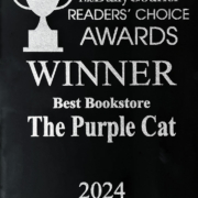 Glossy black reflective award plaque with silver engraved text that reads: "The Daily Courier Readers' Choice Awards Winner Best Bookstore The Purple Cat"